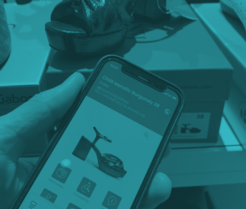a consumer spotted scanning a Buyerdock iQRcode™ to get further product information.