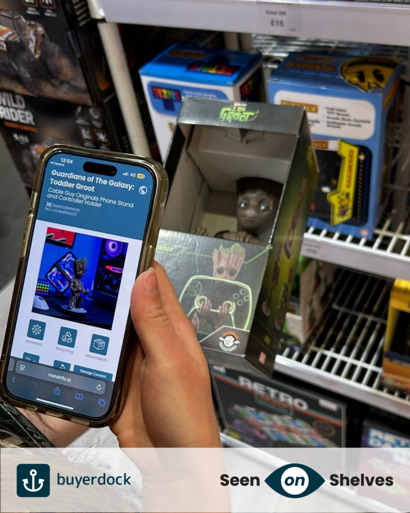 Seen on shelves in Lakeside, Menkind the EXG Pro's Marvel Groot. A consumer is scanning Buyerdock's iQRcode.